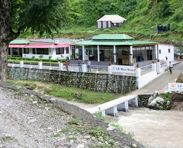 Enjoy panoramic vistas at Tip N Top viewpoint with TravelTaxi's scenic tours in Lansdowne, Uttarakhand.