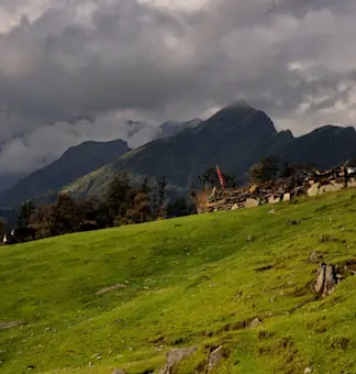 Experience stunning sunrise at Chandrashila Peak with TravelTaxi's guided treks from Chopta, Uttarakhand.