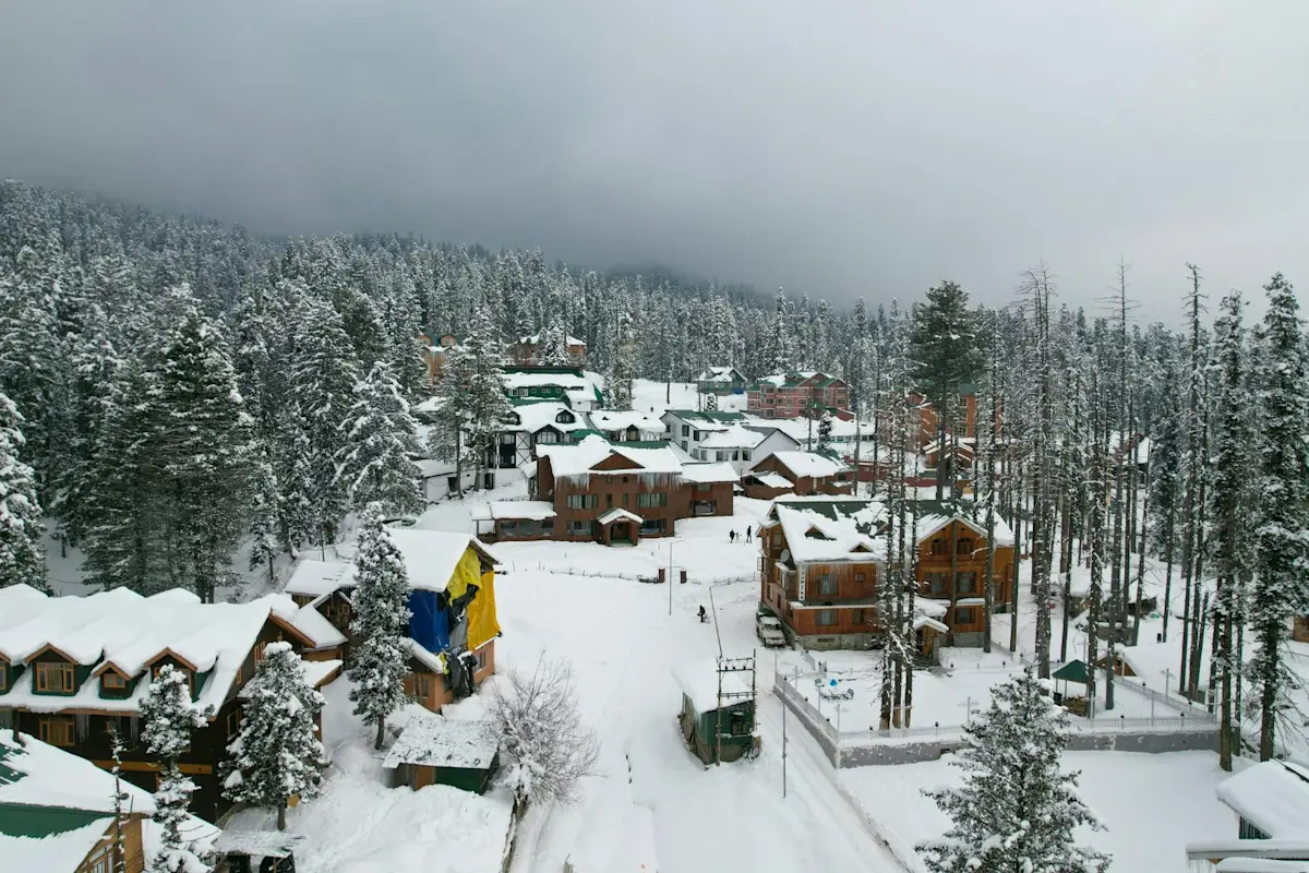Experience world-class skiing at Gulmarg Ski Resort with TravelTaxi's winter adventure tours in Kashmir.