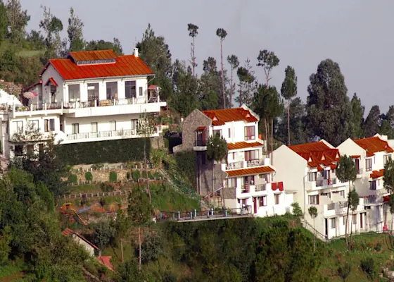 Experience panoramic Himalayan vistas at Chaubatia Gardens with TravelTaxi's guided tours in Ranikhet, Uttarakhand.