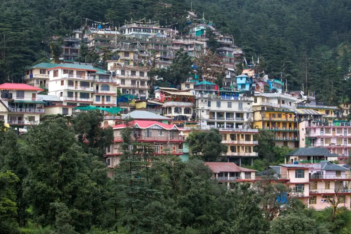 Explore natural beauty at Bhagsu Falls with TravelTaxi's eco-tours in Dharamshala, Himachal Pradesh.