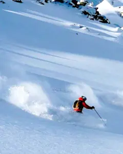 Experience thrilling adventures with TravelTaxi - Skiing in Auli's powdery slopes.