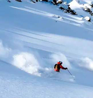 Experience thrilling adventures with TravelTaxi - Skiing in Auli's powdery slopes.