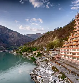Discover yoga and meditation at ashrams with TravelTaxi's wellness tours in Rishikesh, Uttarakhand.