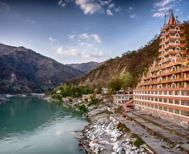 Discover yoga and meditation at ashrams with TravelTaxi's wellness tours in Rishikesh, Uttarakhand.
