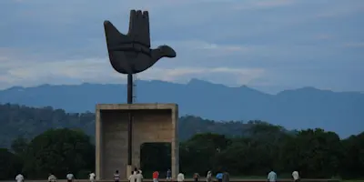 Discover Chandigarh's architectural wonders with TravelTaxi - The iconic Capitol Complex.