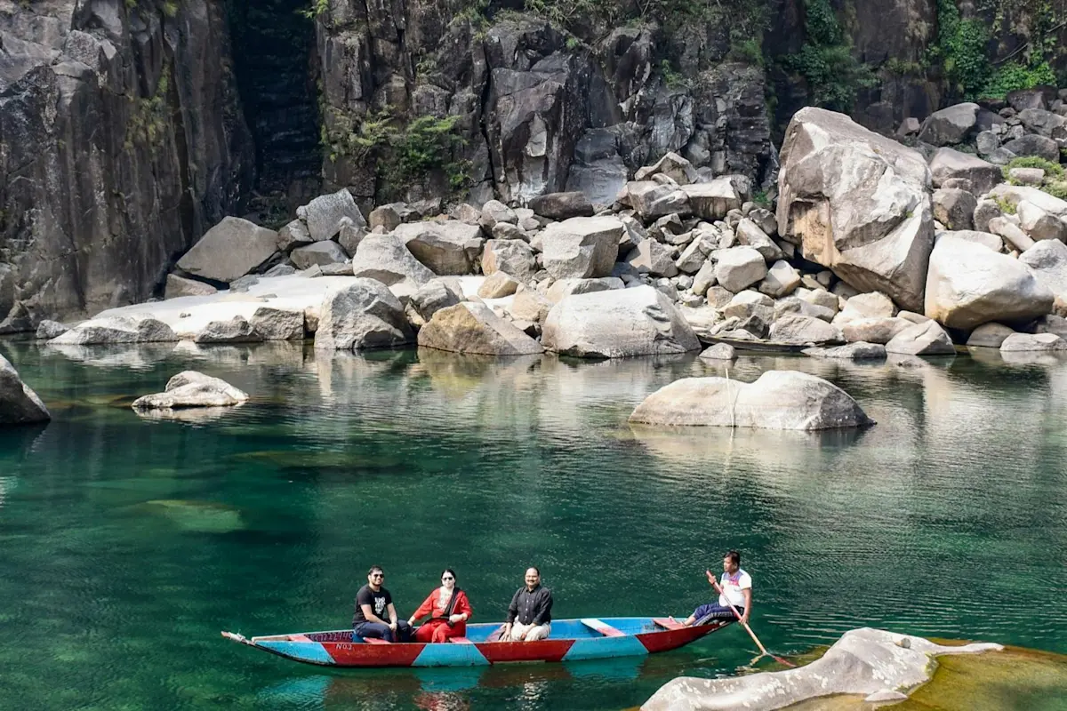 Explore the ancient living root bridges of Nongriat with TravelTaxi's guided treks in Meghalaya.