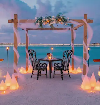 Embrace romantic bliss with TravelTaxi - Beachside honeymoon retreats in the Maldives.
