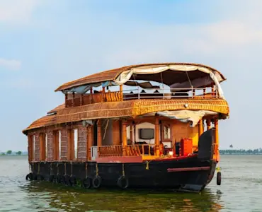 Discover vibrant local culture at Alleppey Beach with TravelTaxi's guided coastal tours in Kerala.
