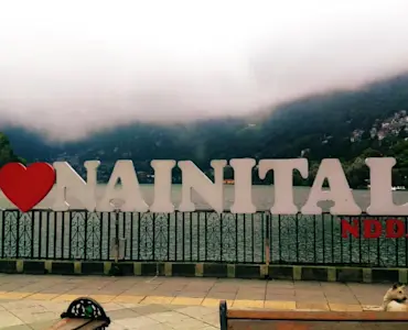 Marvel at Nainital's architectural marvels with TravelTaxi - The historic Naina Devi Temple.