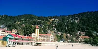 Experience serene beauty of Naini Lake with TravelTaxi's guided boat tours in Nainital, Uttarakhand.