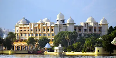Embrace Udaipur's natural beauty with TravelTaxi - The serene Lake Pichola.