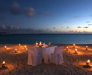 Unwind in romantic serenity with TravelTaxi - Overwater bungalow stays in Tahiti.