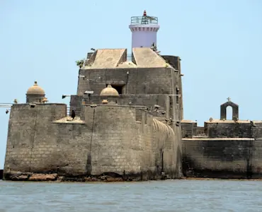 Experience the natural wonders of Naida Caves with TravelTaxi's guided tours in Diu.