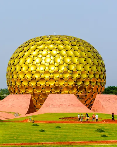 Experience the serenity of Sri Aurobindo Ashram with TravelTaxi's guided spiritual tours in Puducherry.