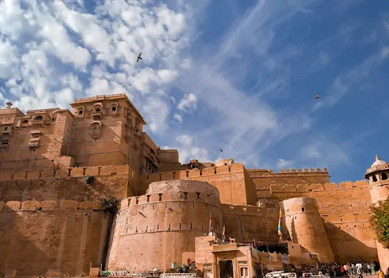 Witness the mesmerizing sunset at Sam Sand Dunes in Jaisalmer - Let TravelTaxi guide you through the desert safari.