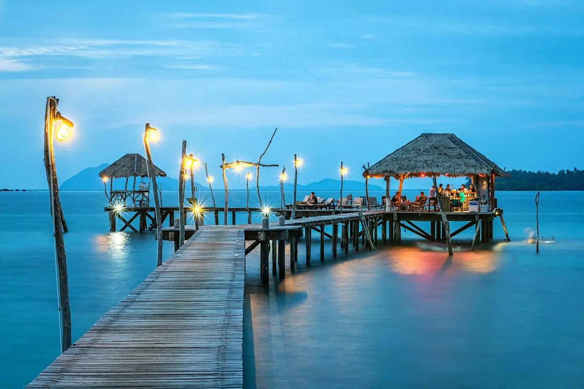 Beach Relax at the serene Pushkar Lake with TravelTaxi - A sacred water body offering a tranquil beach-like experience in Rajasthan.