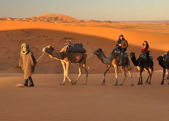 Explore the intricately carved Patwon Ki Haveli in Jaisalmer with TravelTaxi - A marvel of Rajasthani architecture.