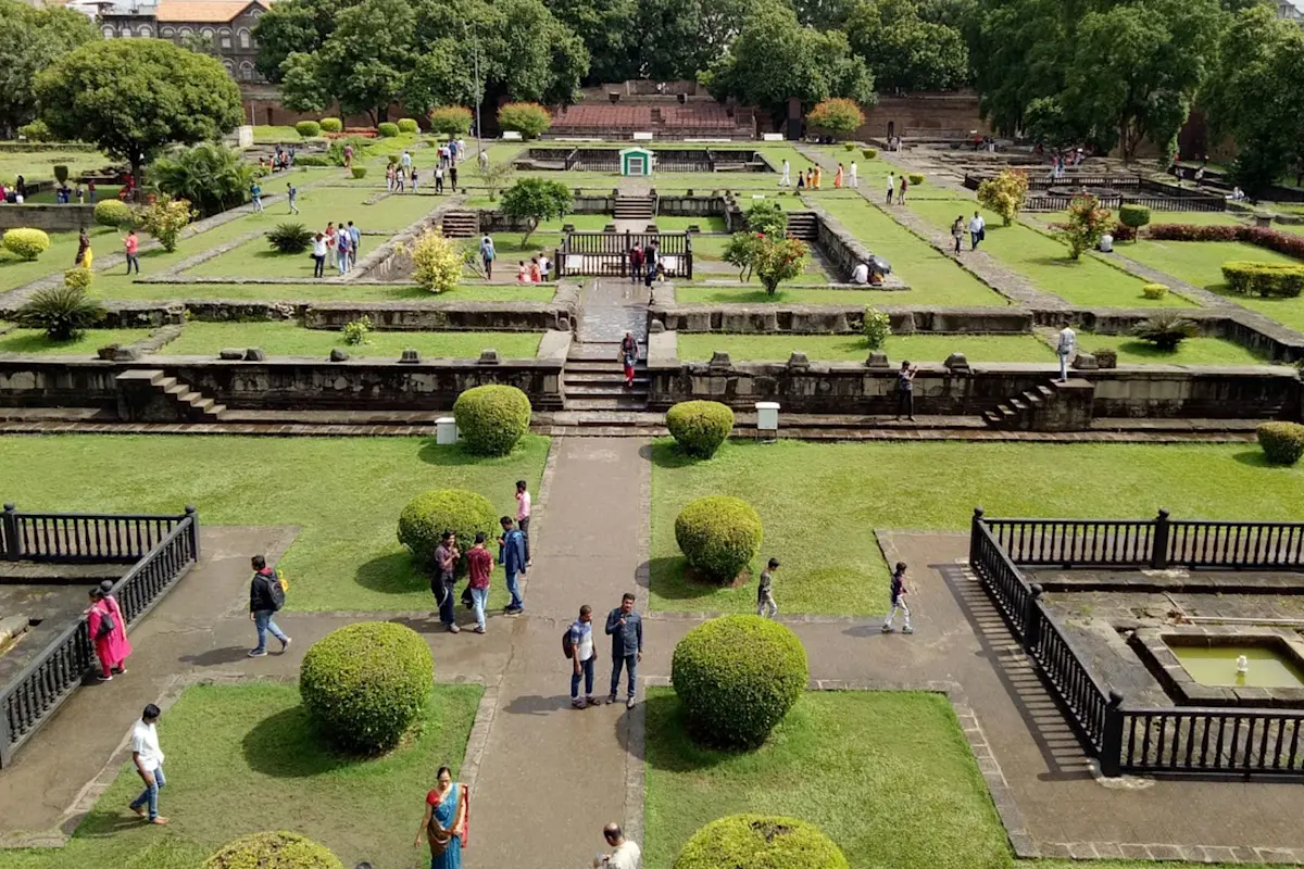 Discover the vibrant Dagdusheth Halwai Ganpati Temple with TravelTaxi's guided tours in Pune.