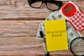 Municipal Bonds on wooden background