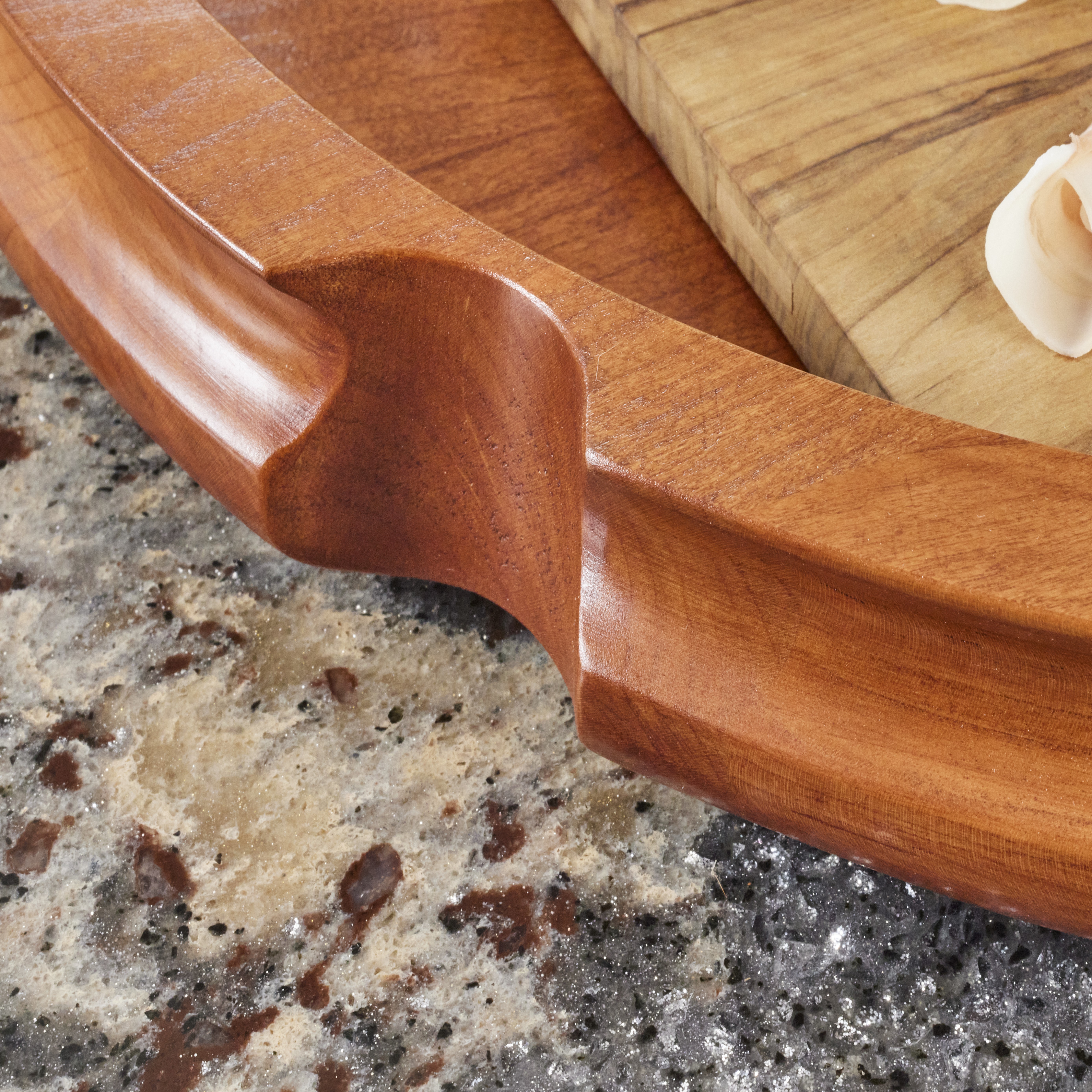 wood with curved edge from edge fluting bit