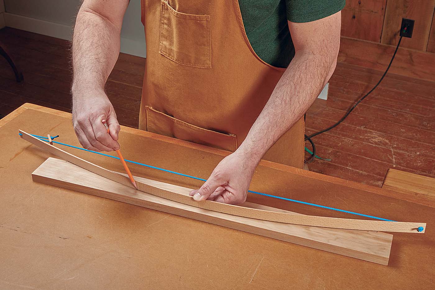 Handmade wood bow with blue string