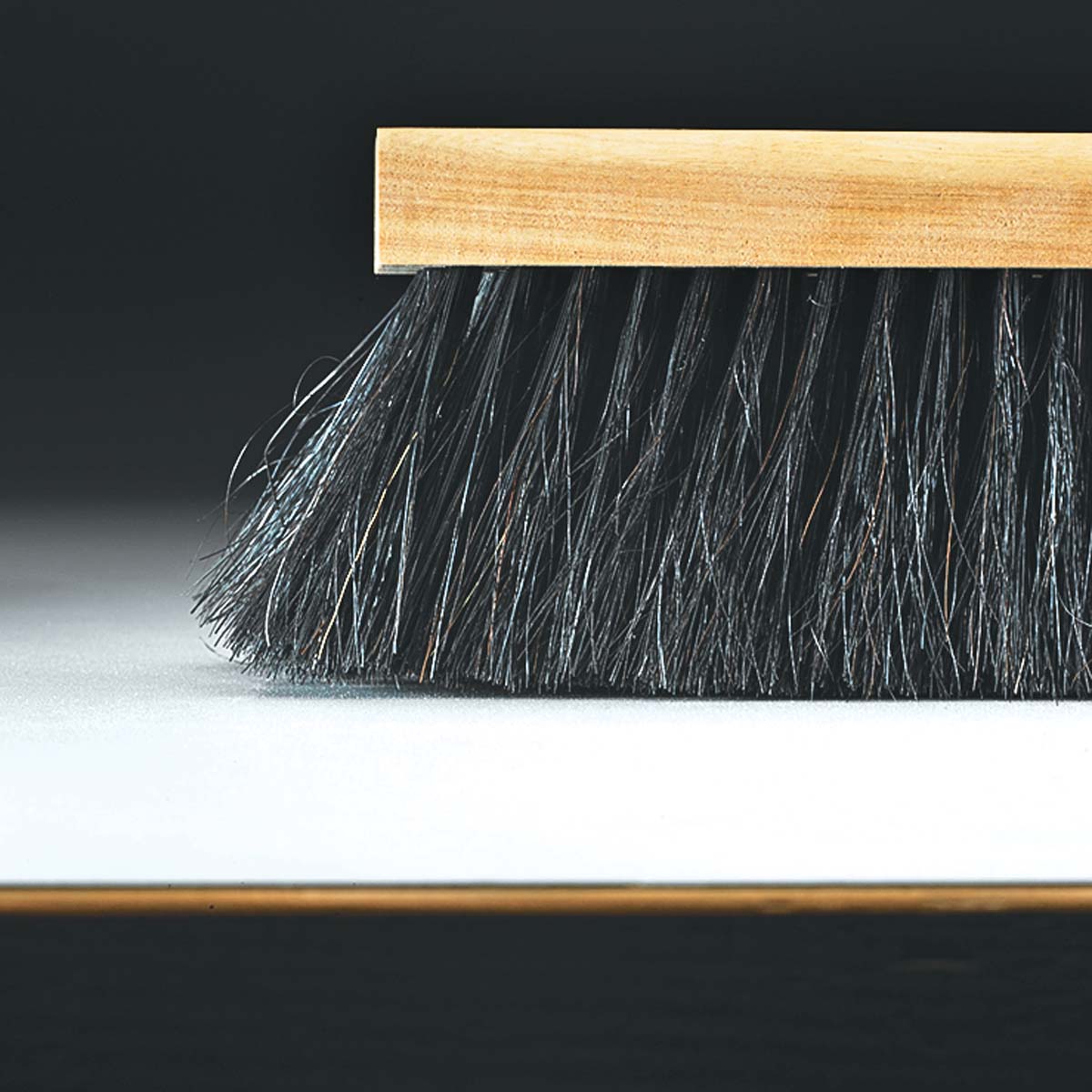 broom with Tampico center surrounded by a horsehair and polystyrene mix