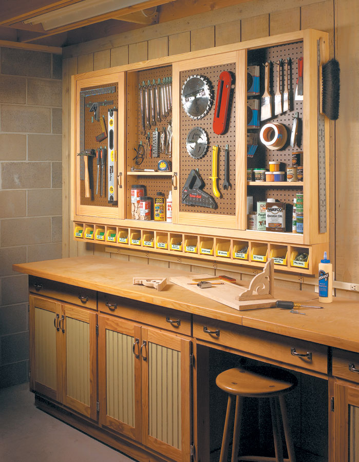 Sliding door pegboard cabinet