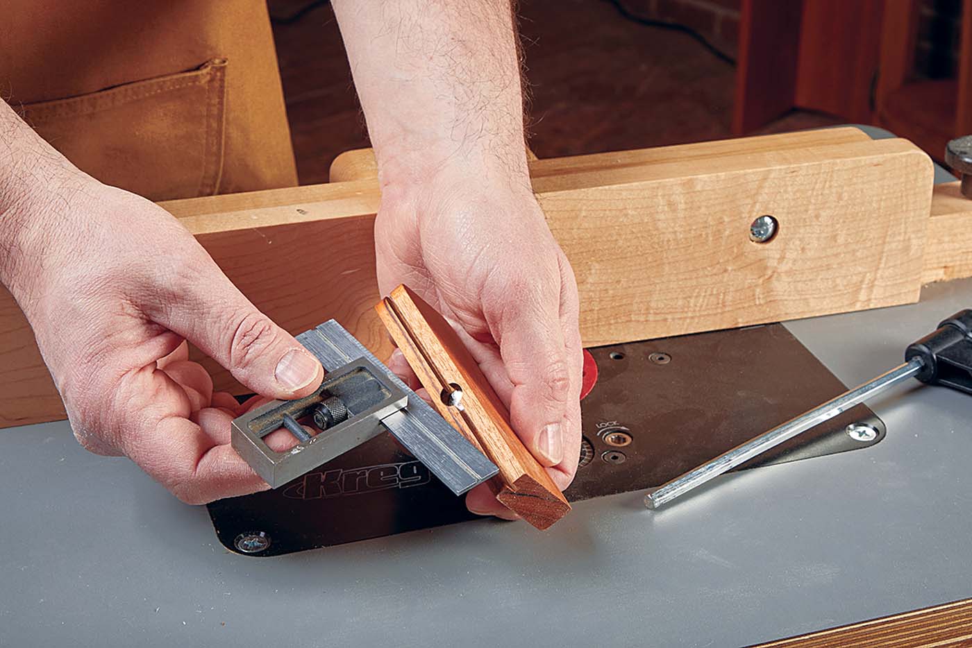 A magnet inset in the block to hold the square in its groove.