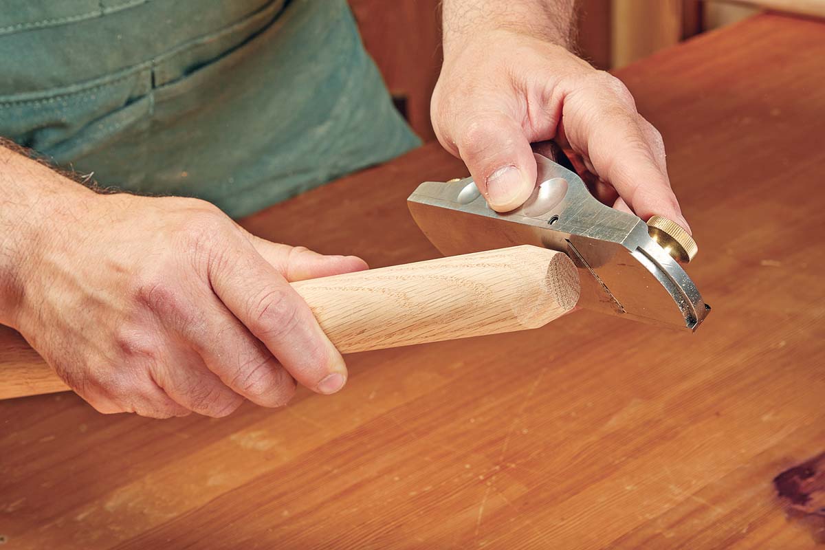 chamfering the end of wood tenon with a block plane