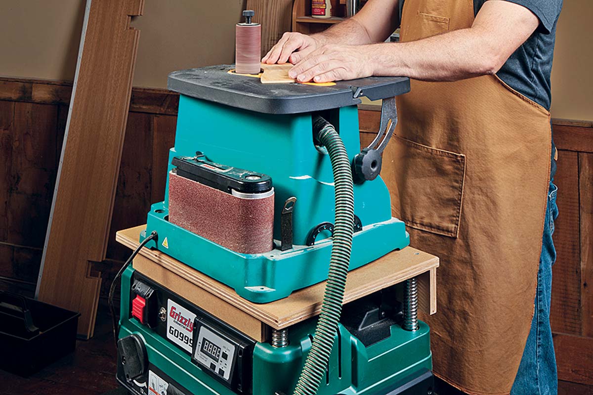 rollers on top of auxillary shelf sitting on planer