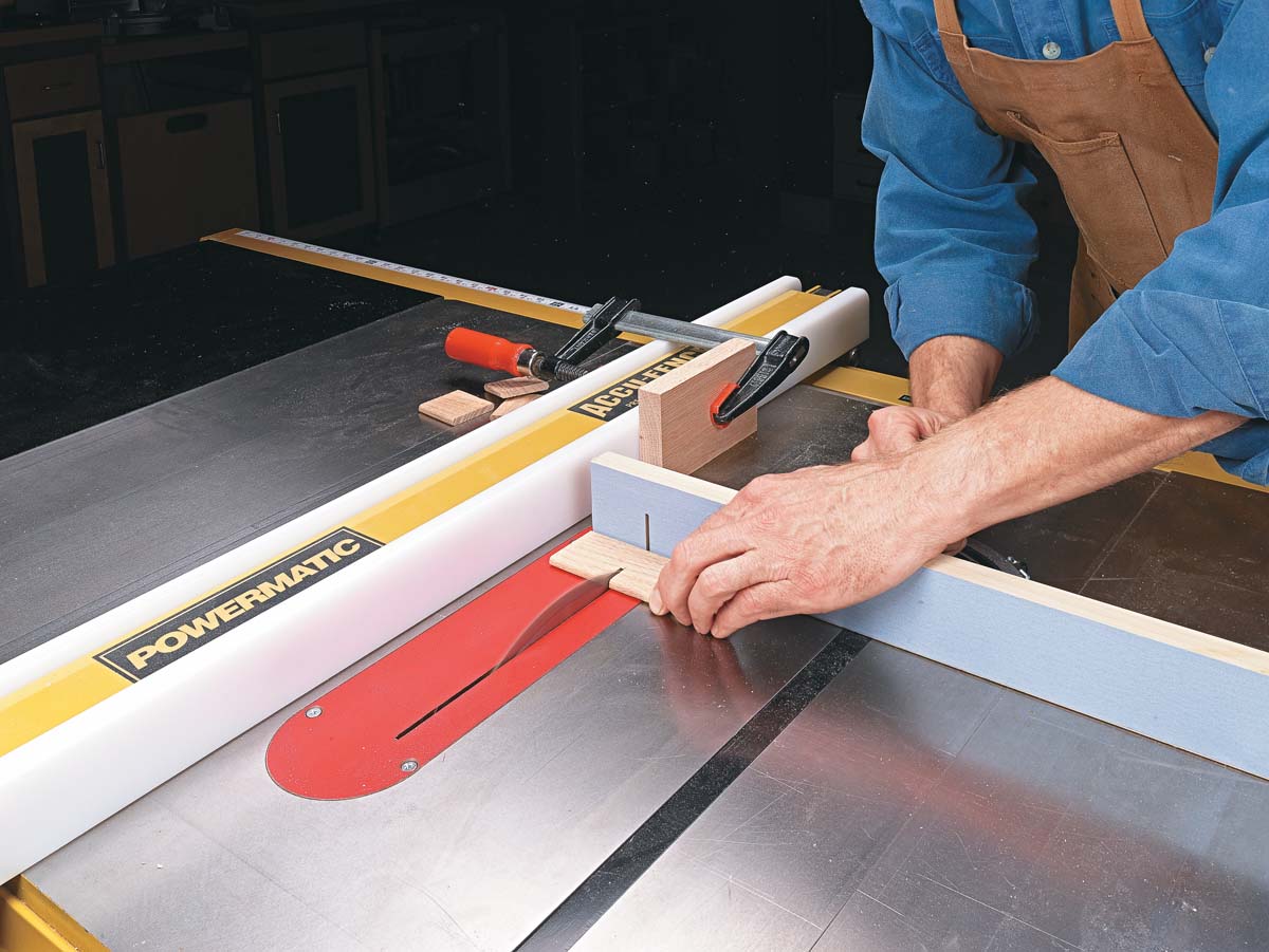 cutting tenons at table saw with clamped stop block setup