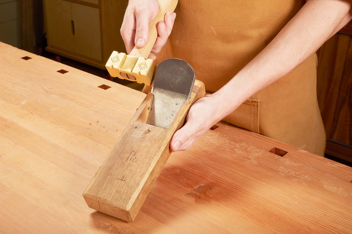 brass mallet hammering/shaping metal