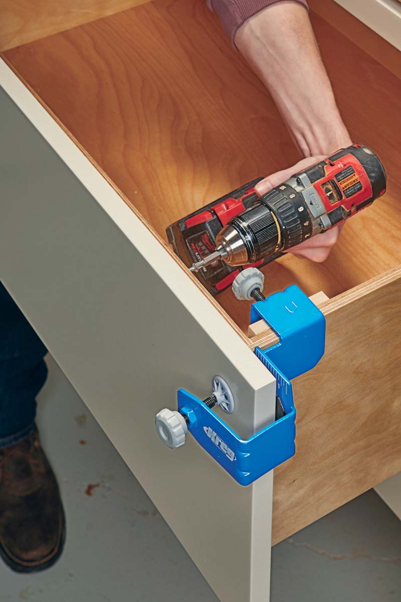 using the second part of clamp to secure the false front for drilling