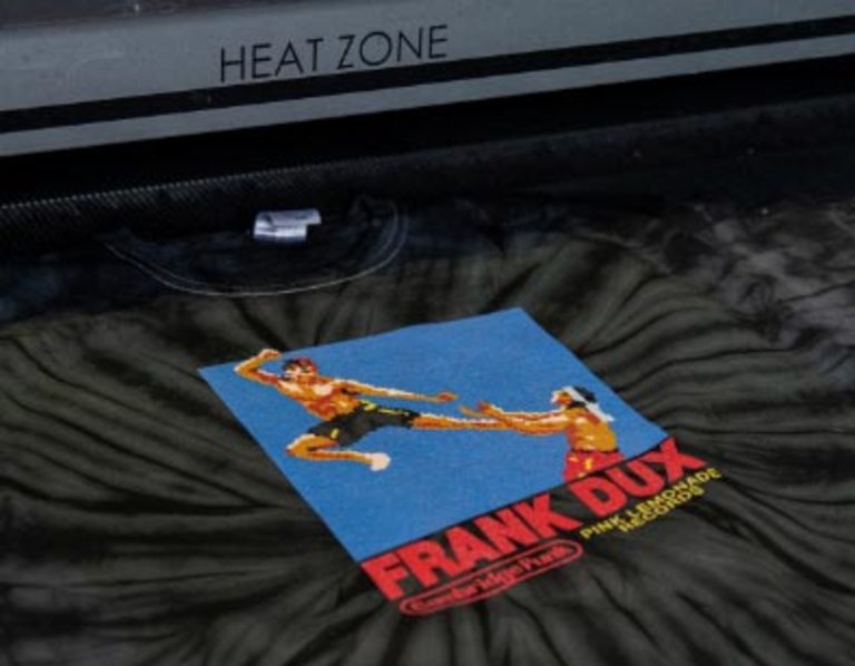 Finished t-shirt being dried in a convection dryer