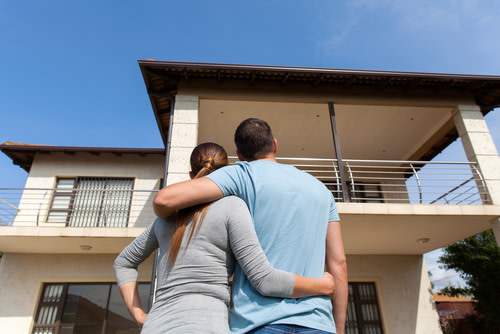 Young Couple Looking at their new home