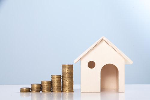 House wth Coins Stacked