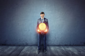 Businessman with a Shiny Coin