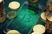 Smartphone surrounded by bitcoins