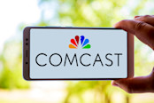 Comcast logo on a smartphone