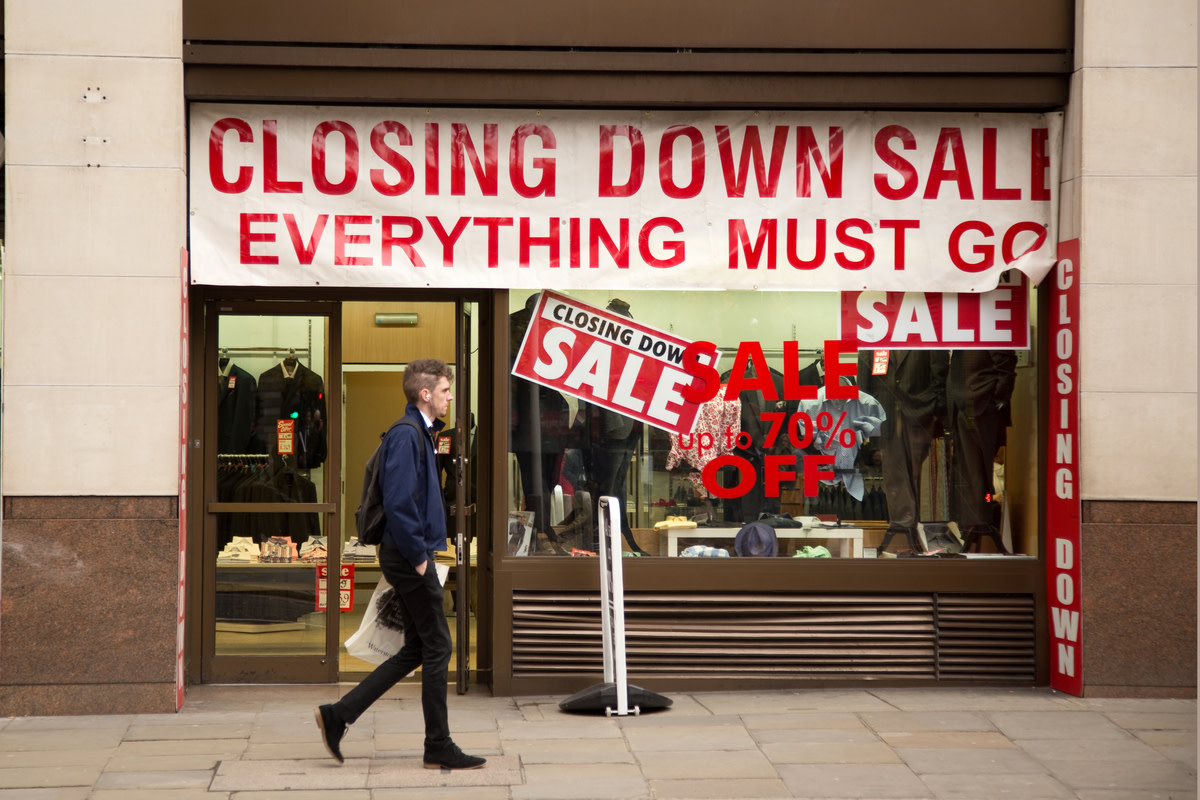Closing down sale sign in a shop window