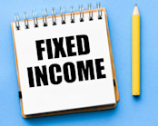 FIXED INCOME words in an office notebook.