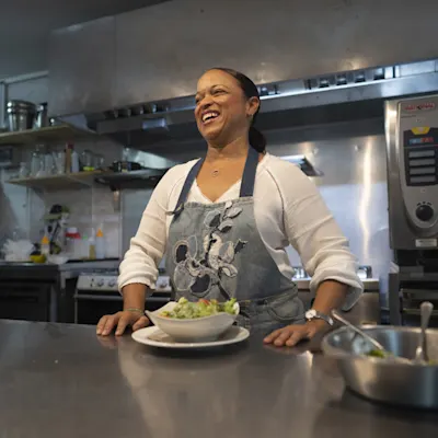 Angela cooking in the Fleur de Marie kitchen.