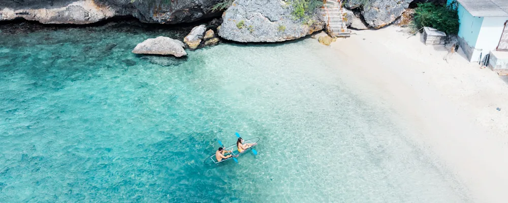 Couple in kayak at beach