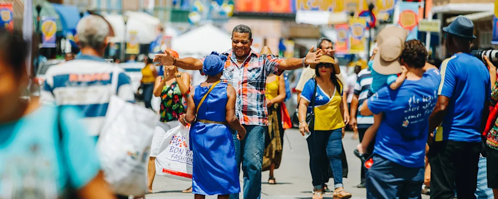 Open arms hug on Curacao Flag Day