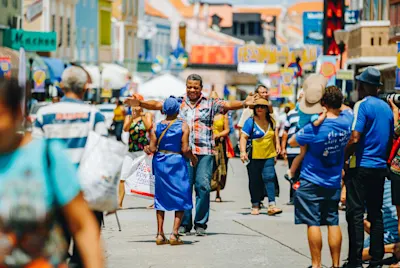 Open arms hug on Curacao Flag Day