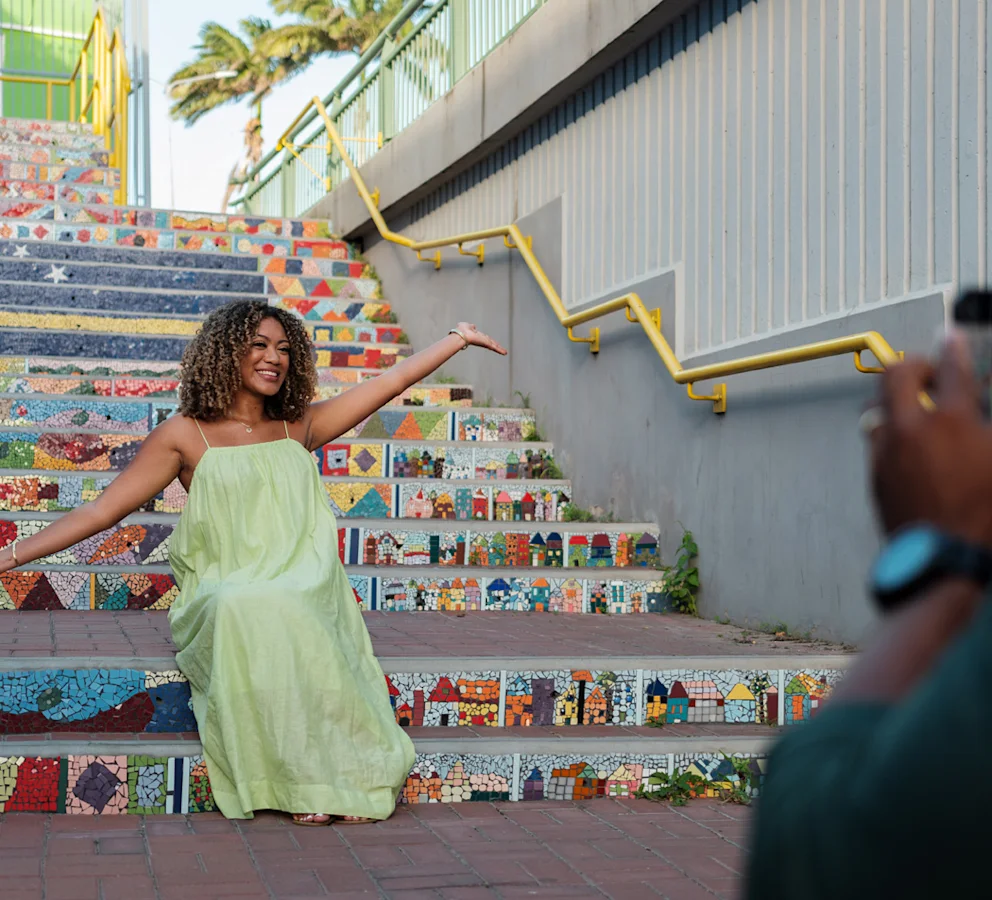 Woman on mosaic stairs