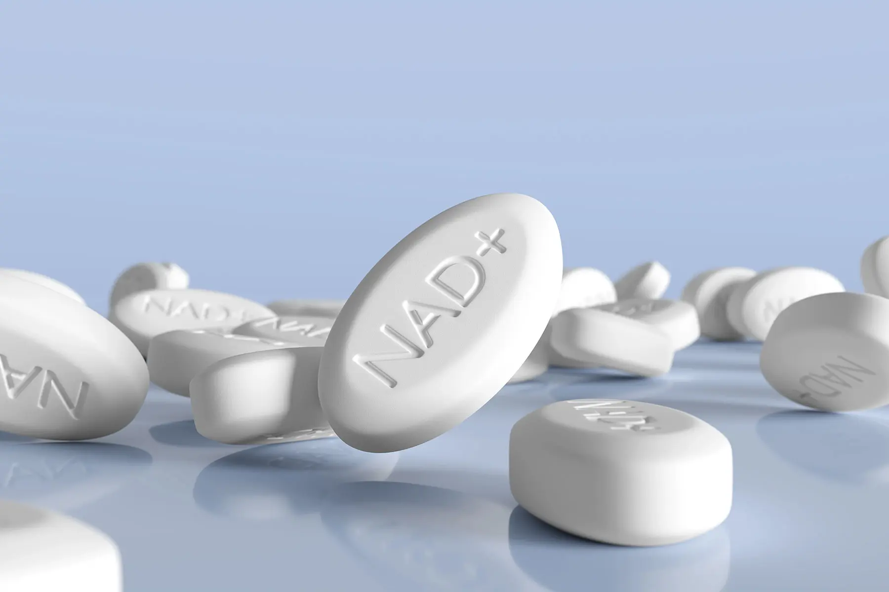 NAD pill supplements on blue background. header