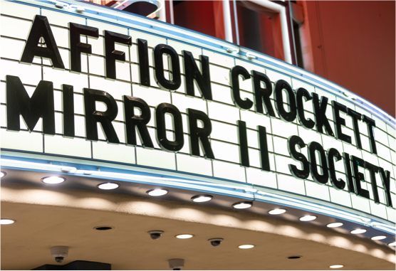 affion crockett marquee sign at theater