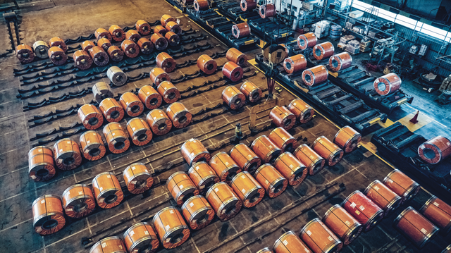 Steel coils lined up at a DFDS logistics warehouse